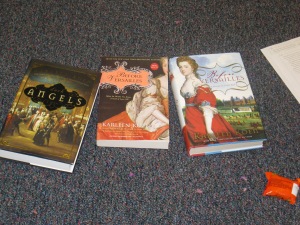 Three of Karleen Koen's novels on classroom floor at WLT retreat, Alpine, TX, 2014